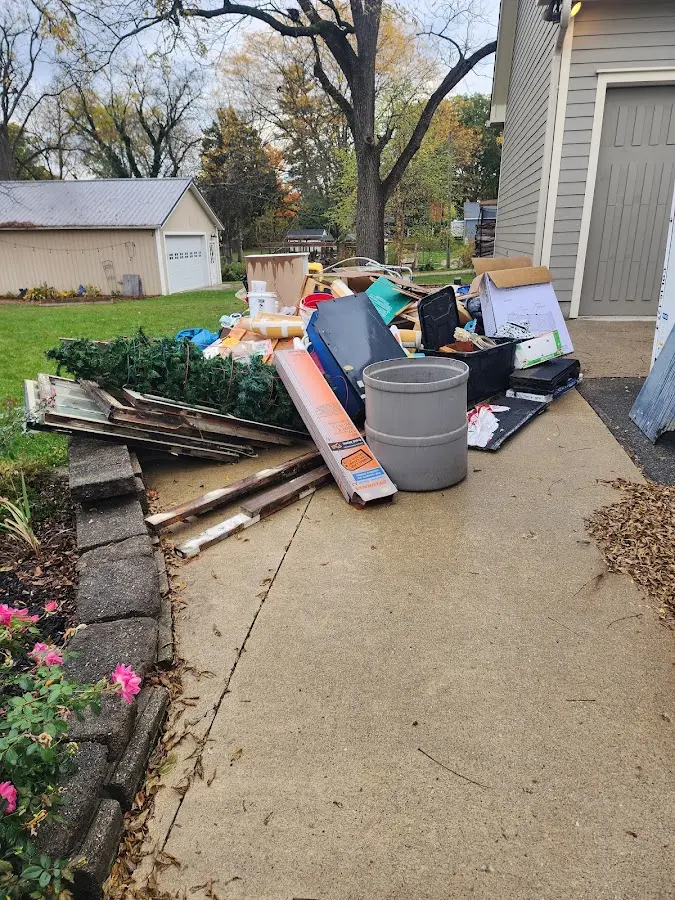 Dumpster being loaded with debris for 3 Yard Dumpster Rental in Minersville